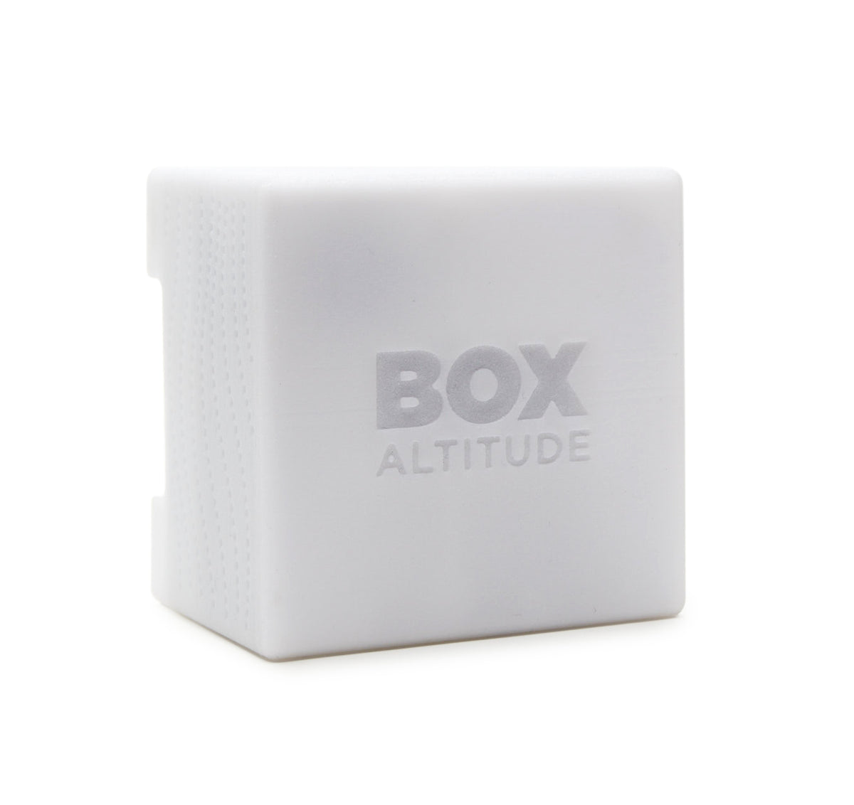 Box Altitude Sensor, a small white cube with an embossed logo and a fine perforated vent on one side